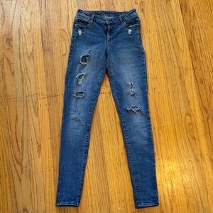 Distressed Blue Jeans